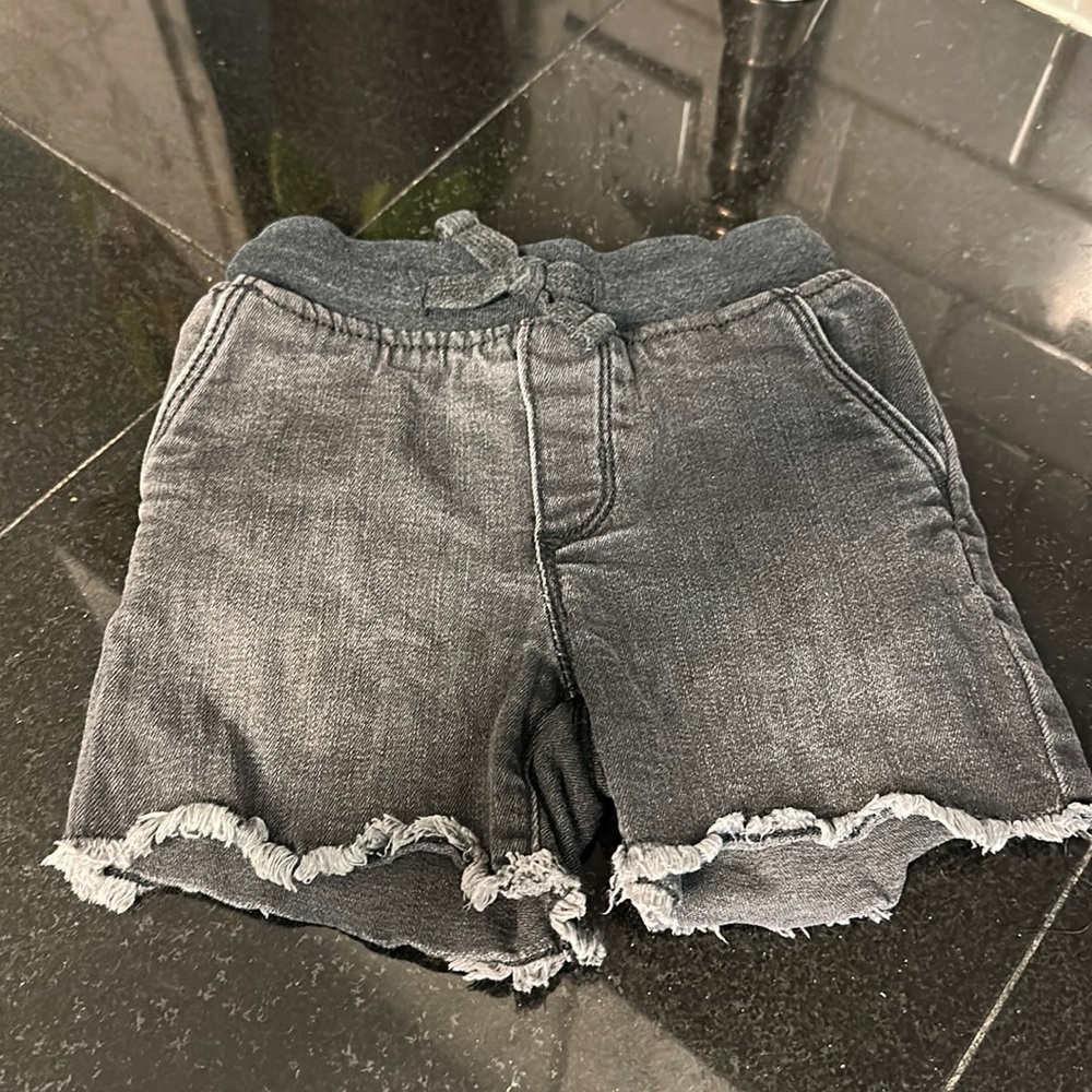 Oshkosh b’gosh cut off black jean shorts.